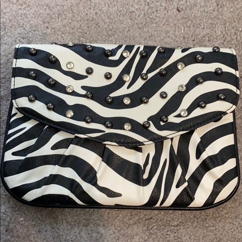 Super cute and versatile Grace Adele clutch